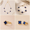 Parure trèfle bleu nuit : collier, bracelet, bague et boucles d'oreilles