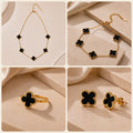 Parure trèfle onyx : collier, bracelet, bague et boucles d'oreilles